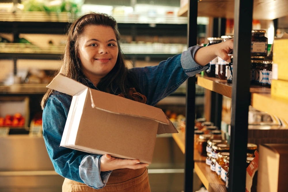 A woman with down syndrome working in a store